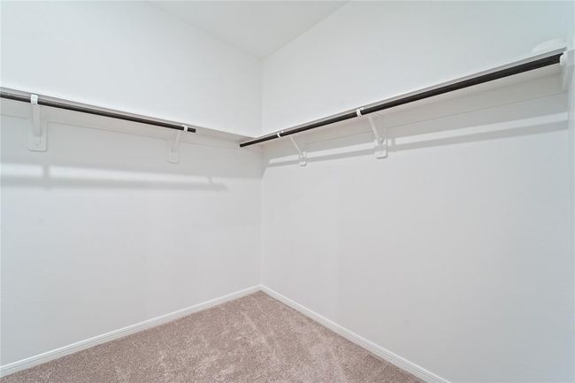 walk-in primary closet | Image 19
