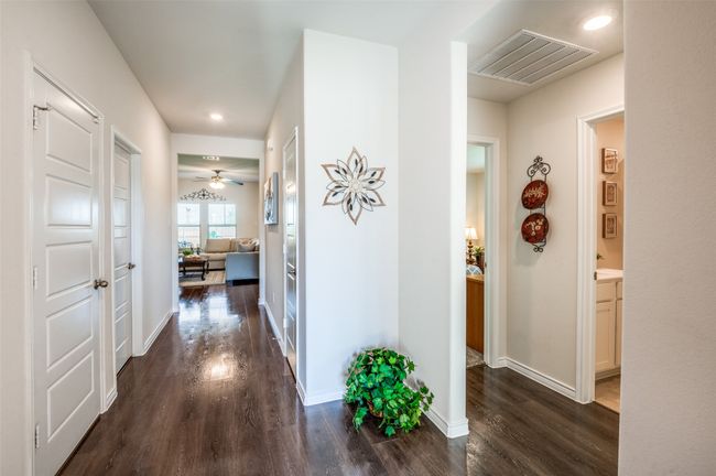 Hall with dark wood-style flooring and recessed lighting | Image 4