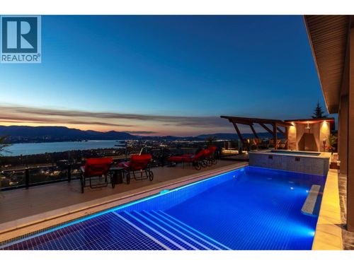 722 Kuipers Cres, House with 4 bedrooms, 5 bathrooms and 4 parking in Kelowna BC | Card Image
