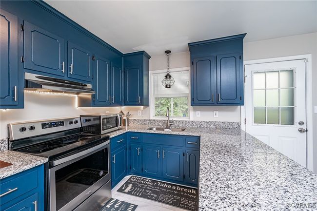 Freshened up cabinets, new granite, updated lighting | Image 5