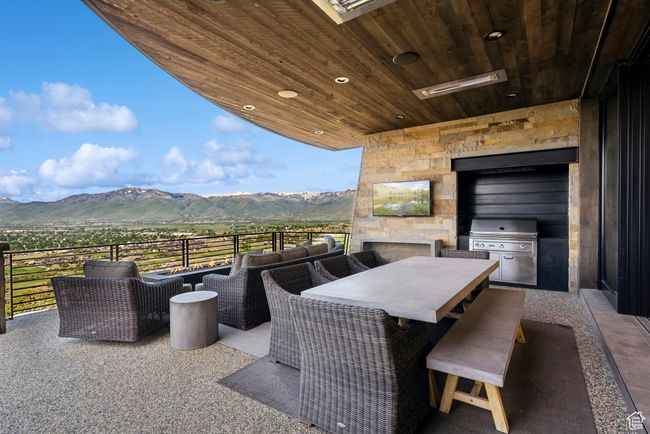 View of patio / terrace featuring an outdoor living space and grilling area | Image 22