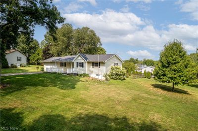 View of front of home with a porch and a front lawn | Image 3