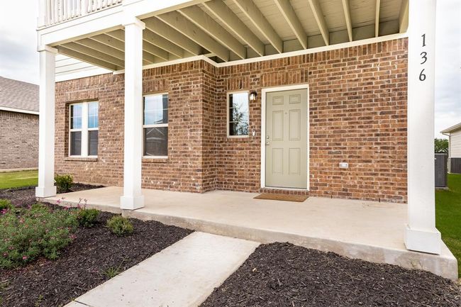 Property entrance featuring brick siding | Image 5