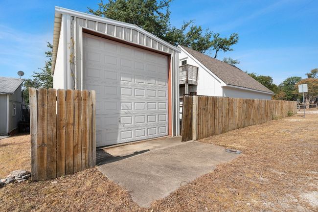 Garage featuring fence | Image 30
