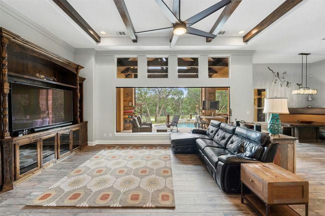 Enjoy the view of the amazing backyard from this huge living room picture window. | Image 8