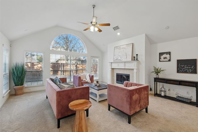 Family room with gas fireplace is perfect gathering spot | Image 10