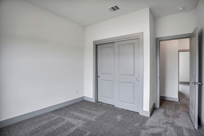 Reach-in closets in the 2 additional bedrooms | Image 20