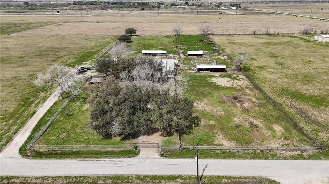 Two driveway entrances — one on the left side and another at the front. | Image 8
