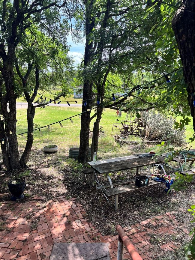 Lawn and a patio area | Image 20