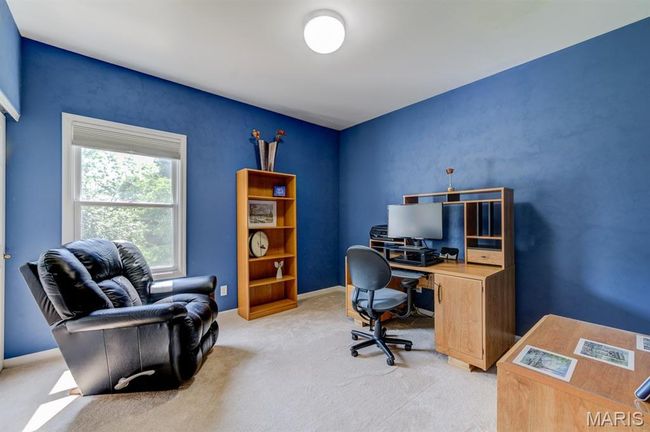 The second bedroom has a window and a closet. | Image 24