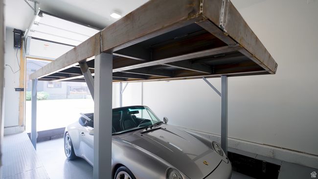 View of parking with a carport | Image 47
