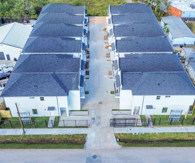 This gated community allows for added security. Each home has a private backyard space and a balcony. | Image 28