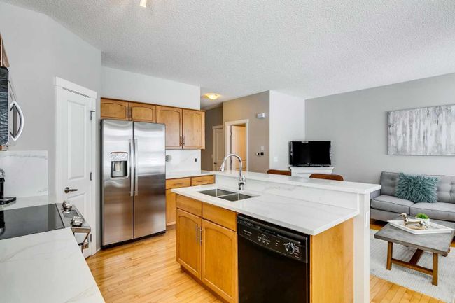 92 Rockyspring Grove Nw, Home with 3 bedrooms, 3 bathrooms and 2 parking in Calgary AB | Image 5