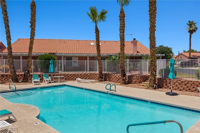 Community pool featuring a patio area | Image 33