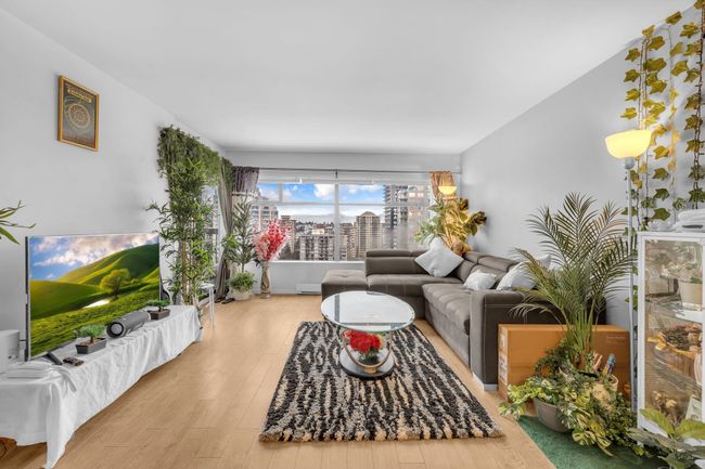 Living room with wood finished floors | Image 11
