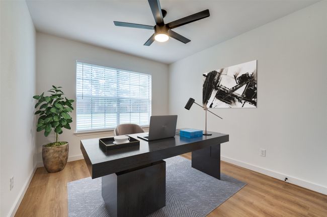 Office space featuring wood finished floors, baseboards, and a ceiling fan | Image 22