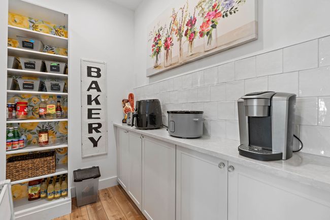 Pantry is deceivingly big. Wraps around and has more storage space not seen. Plugs for all your coffe makers/airfryers/crockpots etc. | Image 16