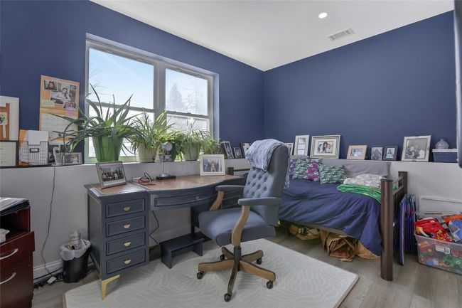 Home office with light hardwood / wood-style floors | Image 29