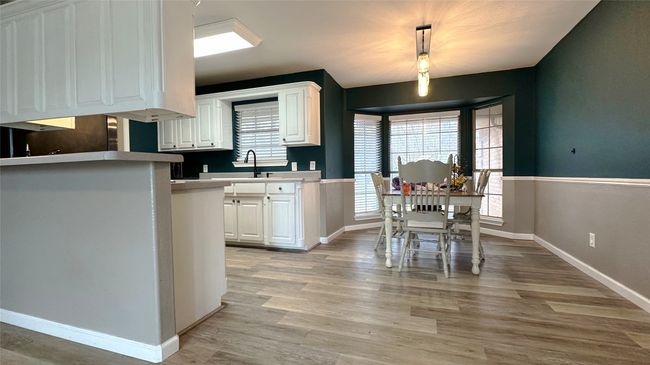 Open living and dining spaces perfect for families | Image 10