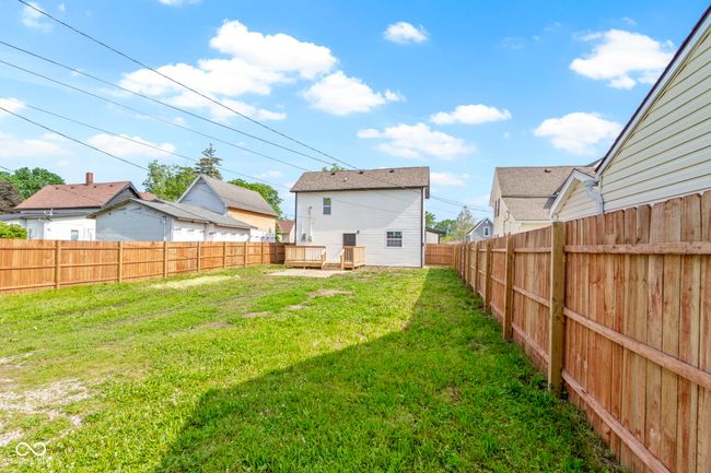 view of yard featuring a residential view and a wooden deck | Image 37