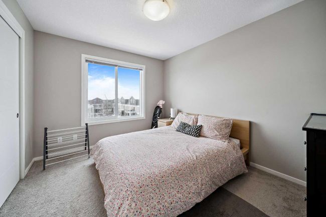 202 - 215 Redstone Ne, Home with 2 bedrooms, 2 bathrooms and 1 parking in Calgary AB | Image 13