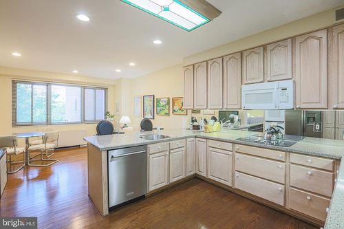 610-11 Slade Ave, BALTIMORE, MD, 21208-5213 | Card Image