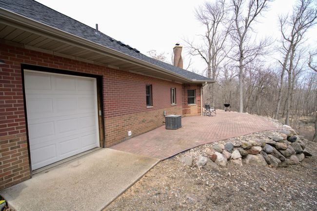 Back view of 3rd stall drive through access & patio | Image 21