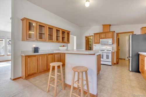 9049 Rampart St, Denver, CO, 80260-6712 | Card Image