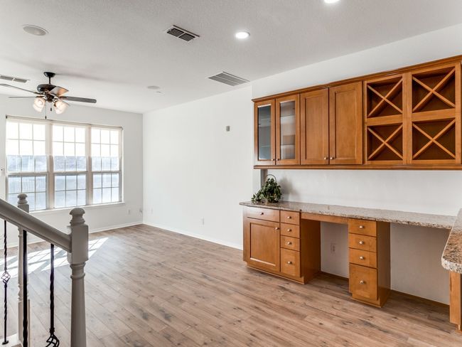 Oversized Family Room with a work space | Image 13