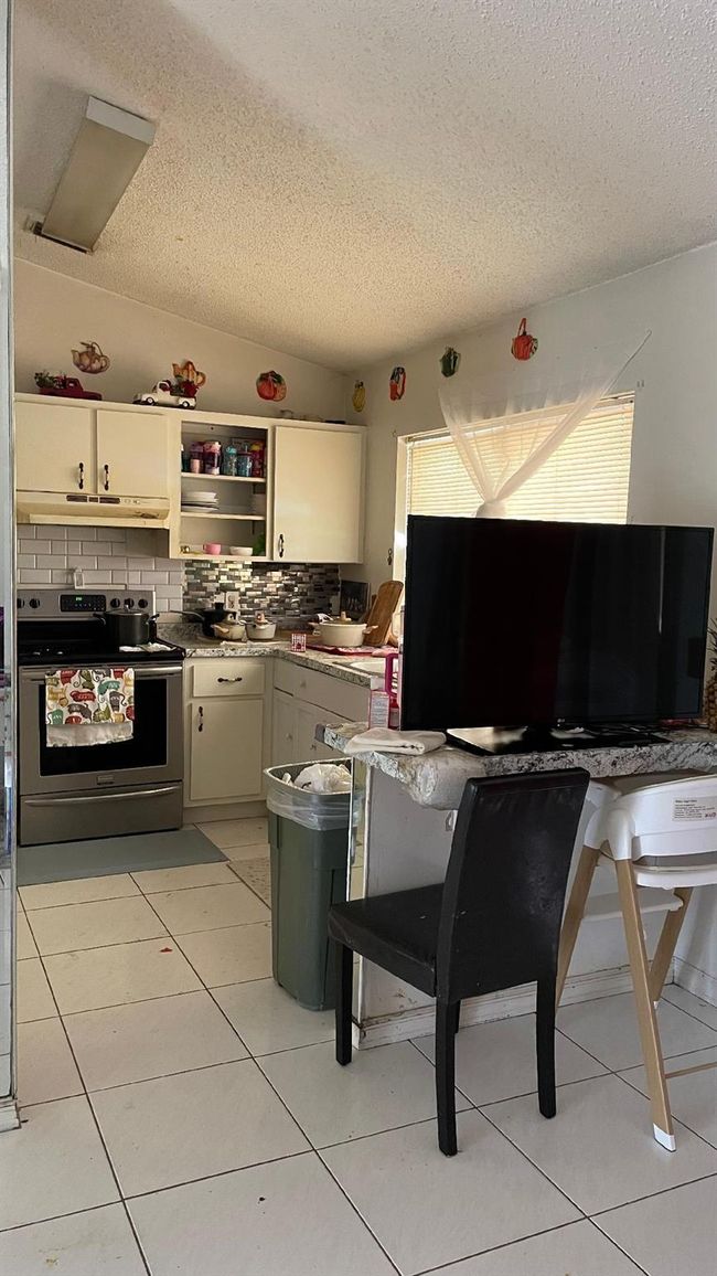1044 Sw Canary Ter, House other with 3 bedrooms, 2 bathrooms and null parking in Port St. Lucie FL | Image 8