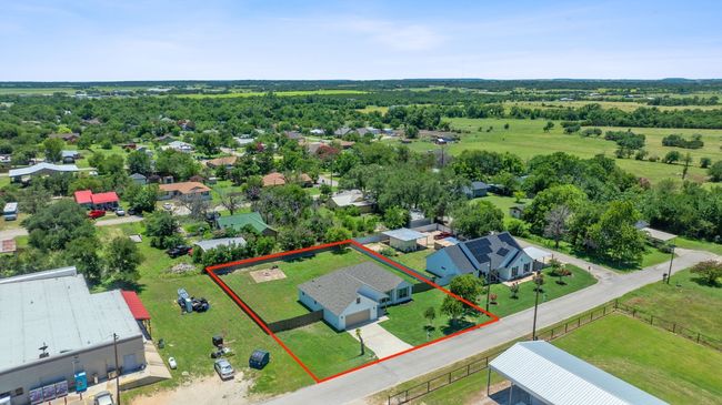 Aerial perspective of suburban area with property parcel outlined | Image 37