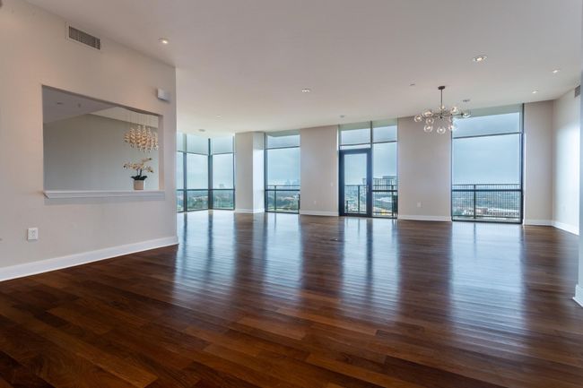 Two living areas with new pass-through bar. | Image 5
