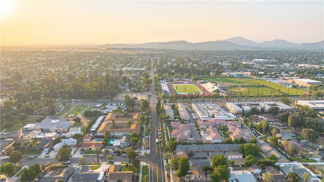 Bird’s-eye views show lot depth, neighborhood proximity, and scale of both main and guest structures. | Image 57