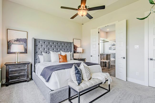 The primary bedroom leads into a luxurious en-suite bath through double doors, creating a true private sanctuary. | Image 22