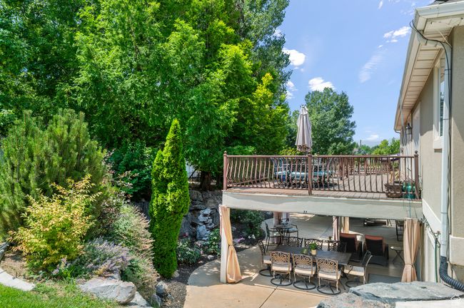 View of patio featuring outdoor dining space and a deck | Image 51