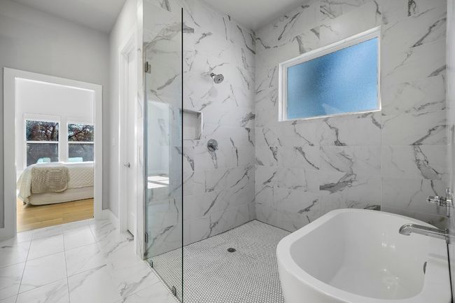 Primary bathroom looking into bedroom | Image 13