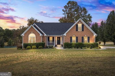 1241 Blue Springs Drive, House other with 3 bedrooms, 2 bathrooms and 4 parking in Loganville GA | Image 1