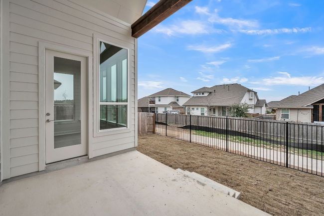 View of patio / terrace featuring a fenced backyard and a residential view | Image 27