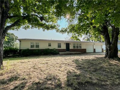 View of front of property with a garage | Image 1