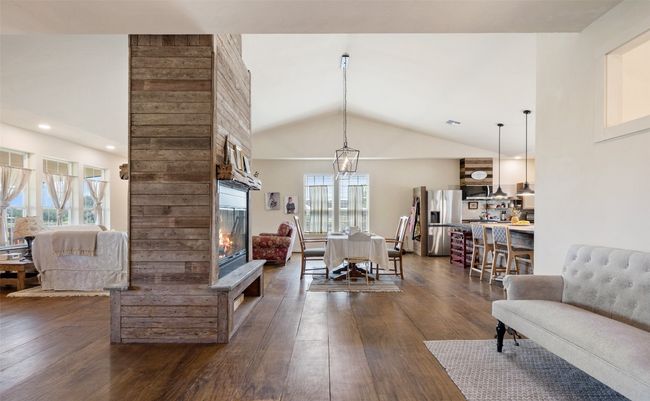 Living / Dining / Kitchen Combo with Double Sided Fireplace. | Image 9