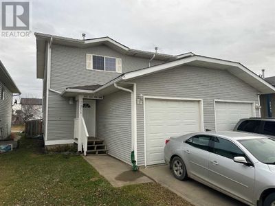 7211 106 St, Home with 3 bedrooms, 3 bathrooms and 3 parking in Grande Prairie AB | Image 1