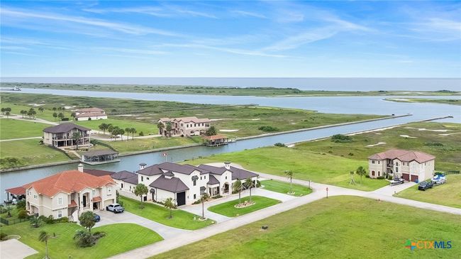 Aerial View of the Front of the Property with Circle Driveway with a Garage for Boat Storage, and a Double Garage with another Entrance on Vineyard Bay | Image 43