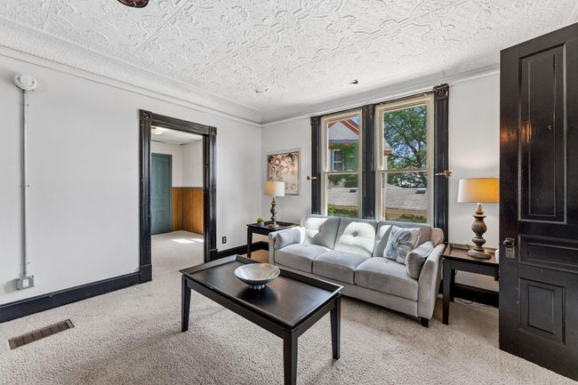 Main level living room with views of the Mississippi River | Image 5