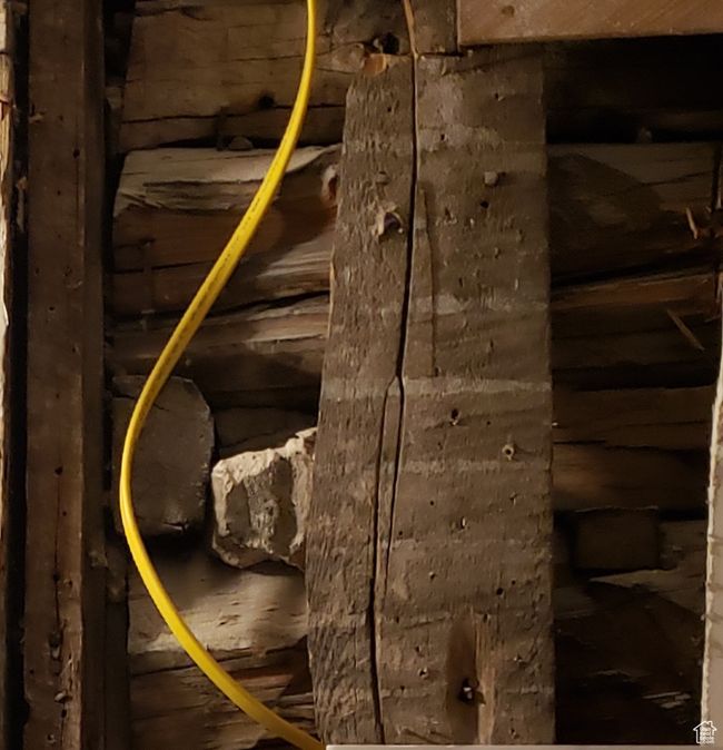 1892 Logs inside the wall from the Original Build | Image 27