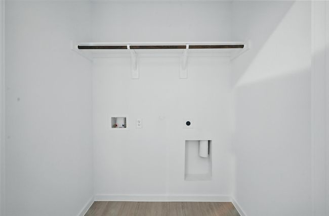 Laundry area with washer hookup, light wood-style floors, and electric dryer hookup | Image 19