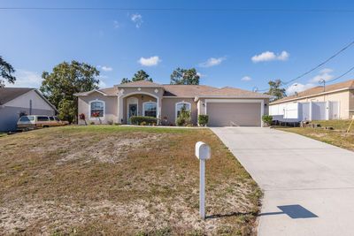 12020 Cavern Road, House other with 3 bedrooms, 2 bathrooms and null parking in Spring Hill FL | Image 2