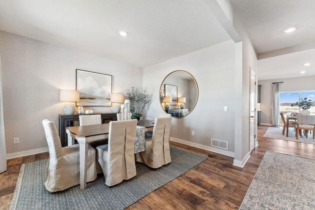 Good sized dining area for many to gather and enjoy OR use this space for something else! Photo of Model Home. Options and colors may vary. Ask Sales Agent for details. | Image 14