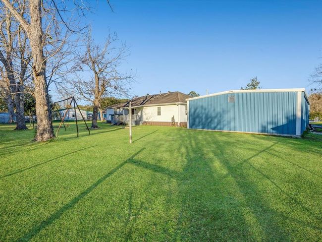 Side view of home and shop | Image 28
