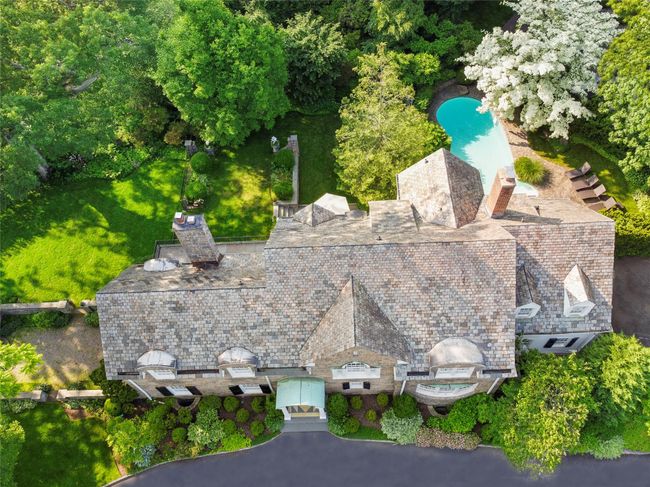 Aerial overview of property's location with a pool | Image 40
