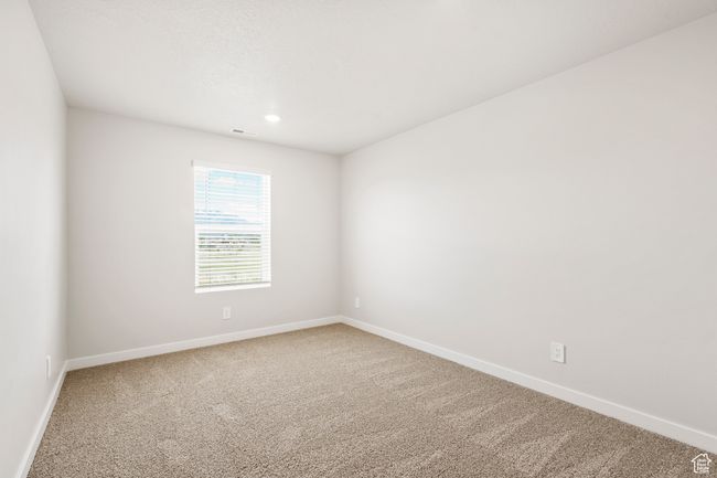 Carpeted empty room with baseboards and recessed lighting | Image 42